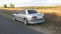 Mitsubishi Carisma Sedan (1 generation) 1.6 AT (90hp) photo, Mitsubishi Carisma Sedan (1 generation) 1.6 AT (90hp) photos, Mitsubishi Carisma Sedan (1 generation) 1.6 AT (90hp) picture, Mitsubishi Carisma Sedan (1 generation) 1.6 AT (90hp) pictures, Mitsubishi photos, Mitsubishi pictures, image Mitsubishi, Mitsubishi images