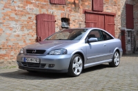 Opel Astra Coupe 2-door (G) 1.8 MT (125 HP) photo, Opel Astra Coupe 2-door (G) 1.8 MT (125 HP) photos, Opel Astra Coupe 2-door (G) 1.8 MT (125 HP) picture, Opel Astra Coupe 2-door (G) 1.8 MT (125 HP) pictures, Opel photos, Opel pictures, image Opel, Opel images